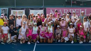 group of people on a tennis court