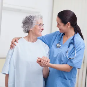 nurse holding patient
