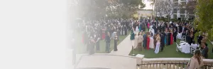 Individuals standing outside for an outdoor event
