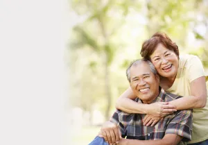 Asian couple hugging each other