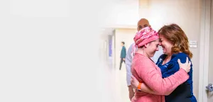 cancer patient holding a patient navigator
