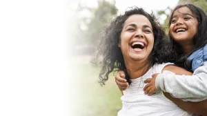 mother smiling with her daughter