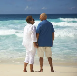 couple standing at the beach together