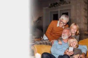 grandparents with children smiling