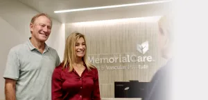 two people smiling