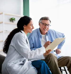 a doctor going through a patient charts