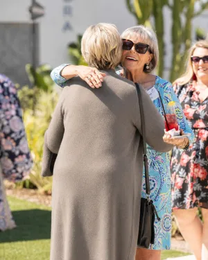 Friends of the Foundation hugging